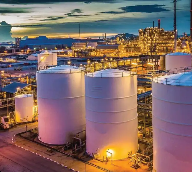 Industrial plant lit at dusk